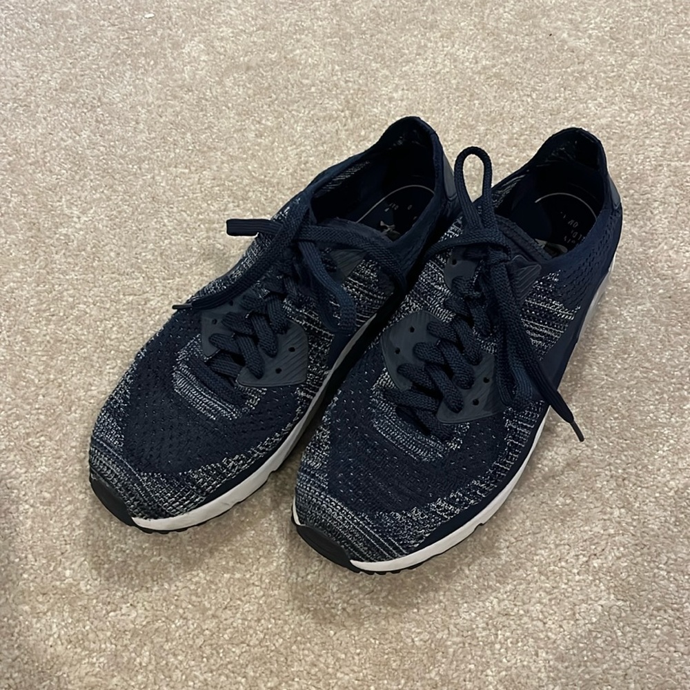 Mens Nike blue and white size 10.5 shoe.